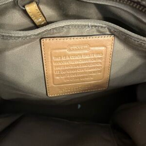 Coach Signature Canvas Tote with tan leather trim and silver hardware